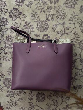 kate spade reversible purple leather tote bag with gold logo